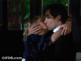 Man And Woman Hugging And Kissing GIF