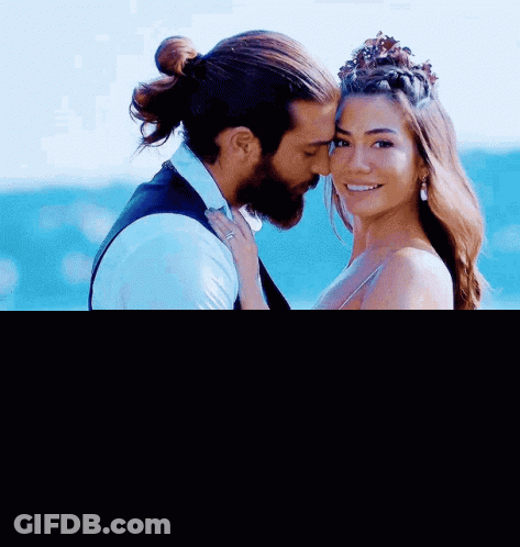Man And Woman Hugging And Kissing GIF