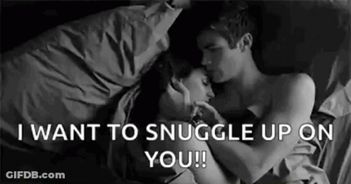 Man And Woman Hugging And Kissing In Bed GIF