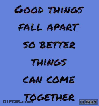 Man And Woman Hugging And Kissing In Front Of Building GIF