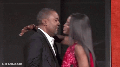 Man And Woman Hugging And Kissing GIF