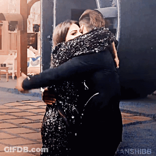 Man And Woman Hugging And Kissing GIF