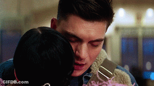 Man And Woman Hugging And Looking At Each Other GIF