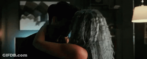 Man And Woman Hugging In A Room GIF