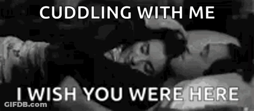 Man And Woman Hugging In Bed GIF