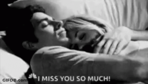 Man And Woman Hugging In Bed Black And White GIF