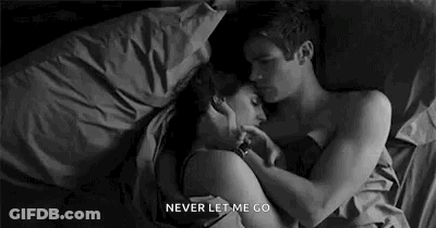 Man And Woman Hugging In Bed GIF