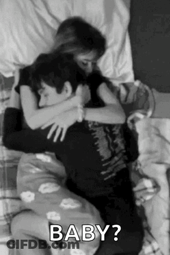 Man And Woman Hugging In Bed GIF