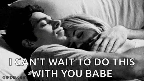 Man And Woman Hugging In Bed GIF