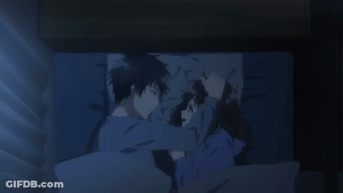 Man And Woman Hugging In Bed GIF