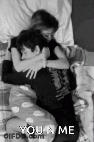 Man And Woman Hugging In Bed GIF