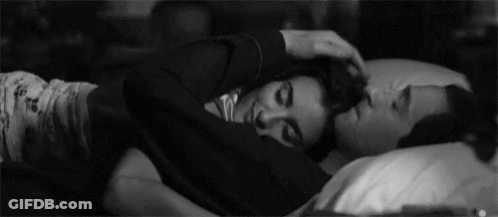 Man And Woman Hugging In Bed GIF
