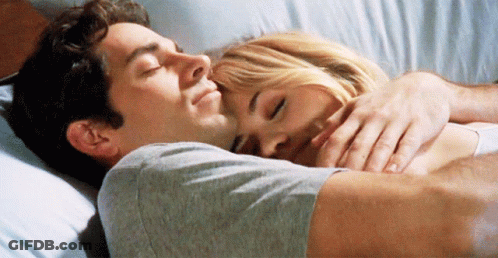 Man And Woman Hugging In Bed GIF