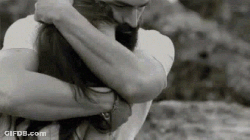 Man And Woman Hugging In Black And White GIF