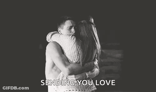 Man And Woman Hugging In Black And White Photo GIF