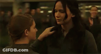 Man And Woman Hugging In Crowd GIF