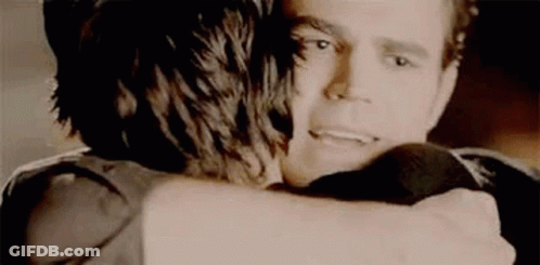 Man And Woman Hugging In Dark Room GIF