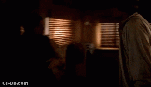 Man And Woman Hugging In Kitchen GIF