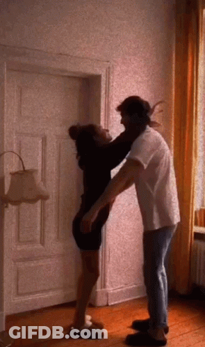 Man And Woman Hugging In Room GIF