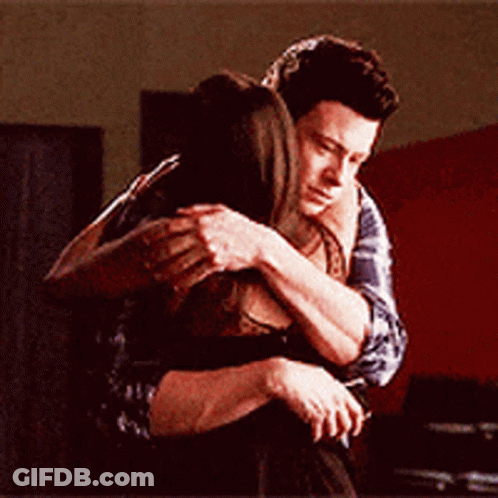 Man And Woman Hugging In Room GIF