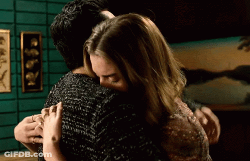 Man And Woman Hugging In Room GIF
