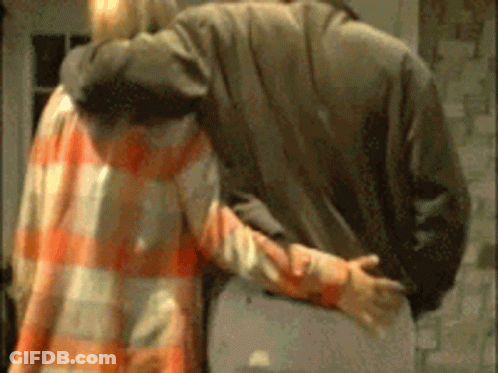 Man And Woman Hugging In Room GIF