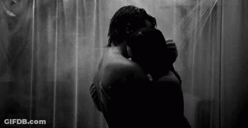Man And Woman Hugging In Shower Black And White GIF