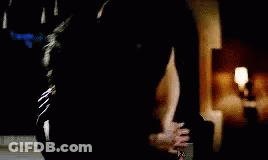 Man And Woman Hugging In The Dark GIF