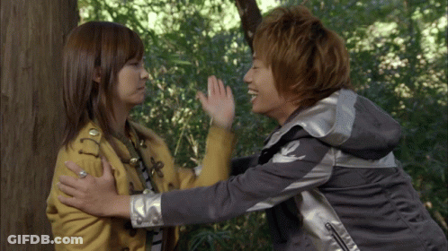 Man And Woman Hugging In Woods GIF