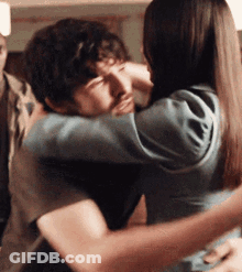 Man And Woman Hugging GIF