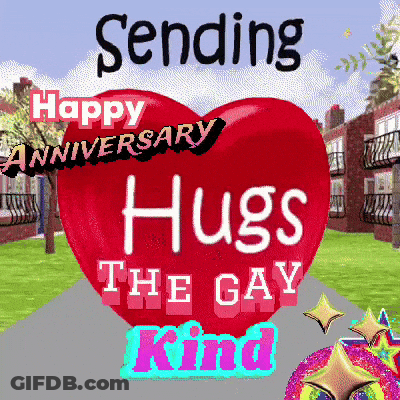 Man And Woman Hugging On Beach GIF