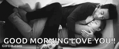 Man And Woman Hugging On Bed GIF