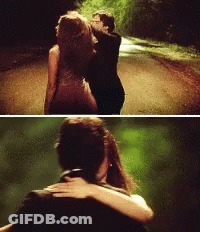 Man And Woman Hugging On Dirt Road GIF