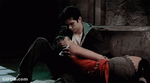 Man And Woman Hugging On Floor GIF