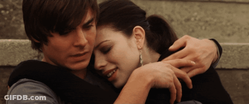 Man And Woman Hugging On Stairs GIF