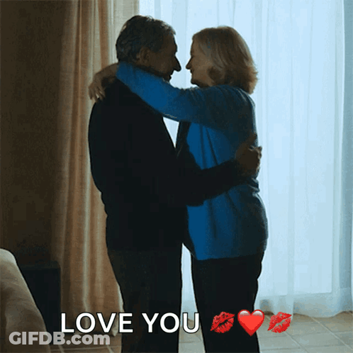 Man And Woman Hugging Saying Love You GIF