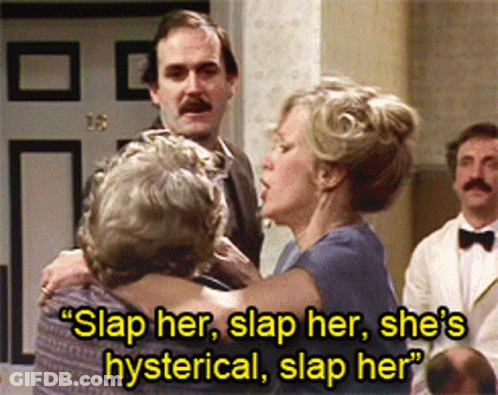 Man And Woman Hugging Saying Slap Her She's Hysterical GIF