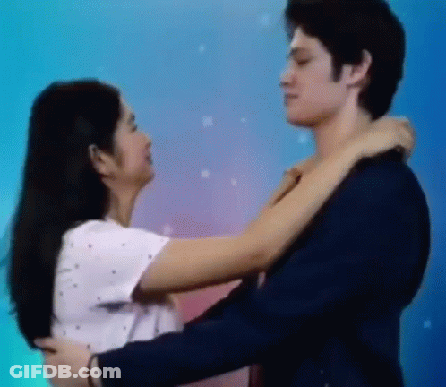 Man And Woman Hugging GIF