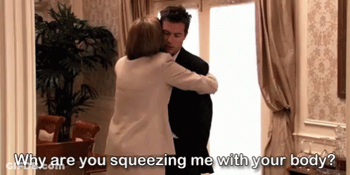 Man And Woman Hugging GIF
