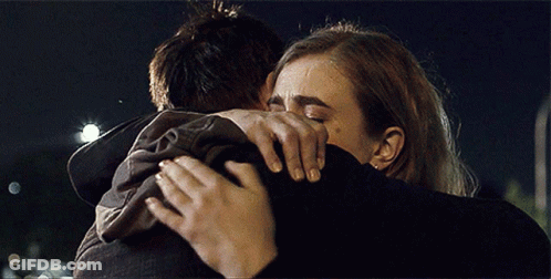 Man And Woman Hugging, Woman Covering Face GIF