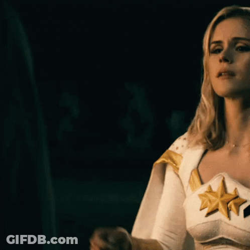 Man And Woman Hugging, Woman In White Shirt With Gold Stars GIF