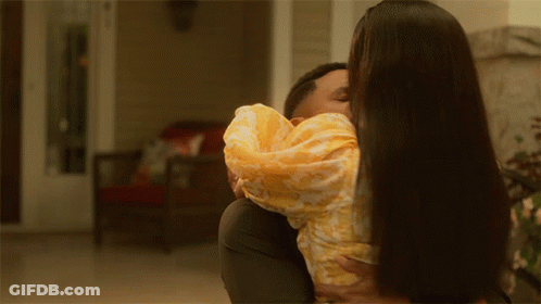 Man And Woman Hugging Woman In Yellow Dress GIF