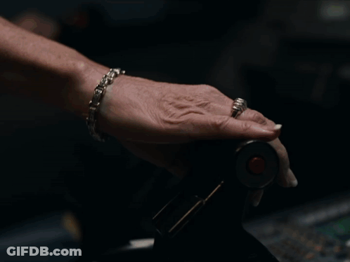Man And Woman In Airplane Cockpit GIF