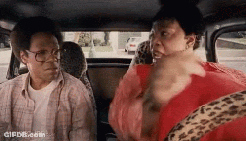 Man And Woman In Back Of Car GIF