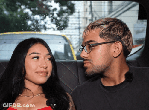 Man And Woman In Back Seat Of Car GIF