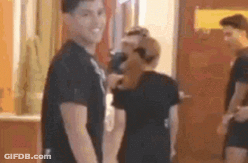 Man And Woman In Black Shirts GIF