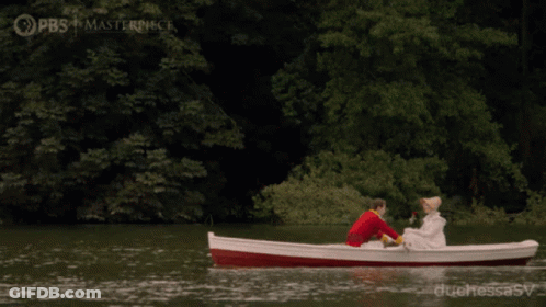 Man And Woman In Boat On Lake Sponsored By PBS And Masterpiece GIF