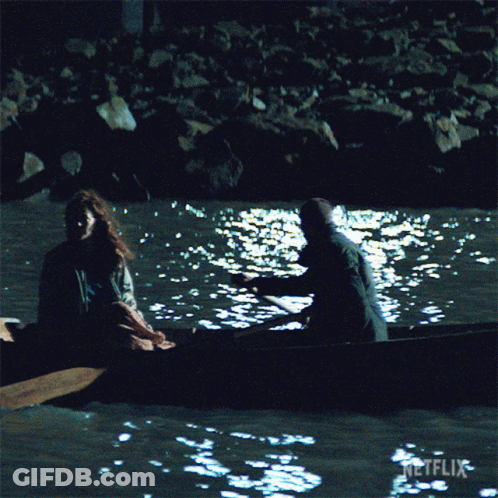 Man And Woman In Boat With Netflix GIF