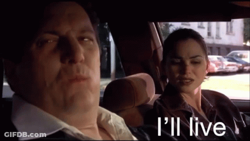 Man And Woman In Car Saying I'll Live GIF