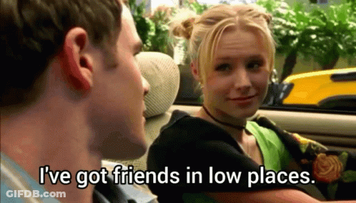 Man And Woman In Car Saying I've Got Friends In Low Places GIF